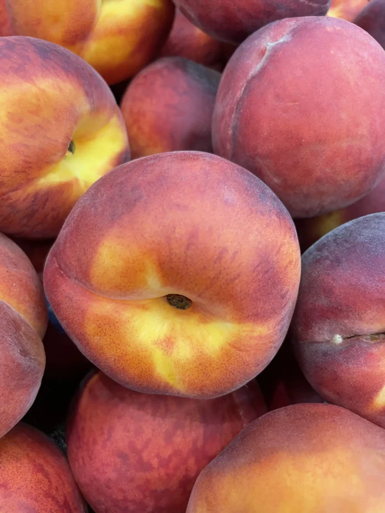 A closeup of a group of peaches